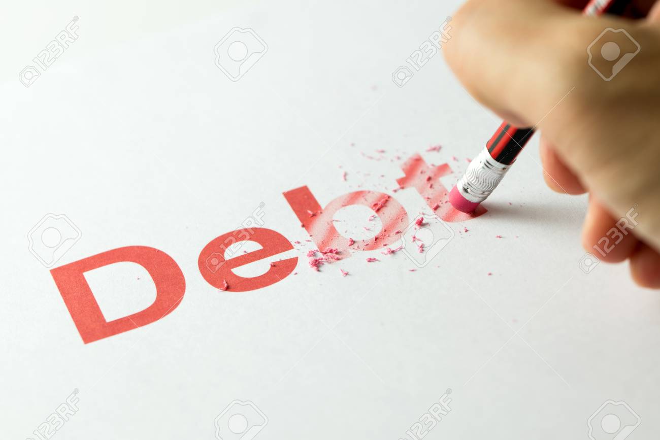Close up of red pencil erasing the word debt on paper - 94606599 Close up of red pencil erasing the word debt on paper - 94606599