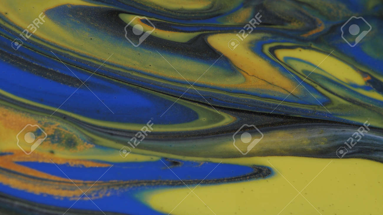 Abstract colorful background of spreading colors. Abstract dark paint background. - 165387565 Abstract colorful background of spreading colors. Abstract dark paint background. - 165387565