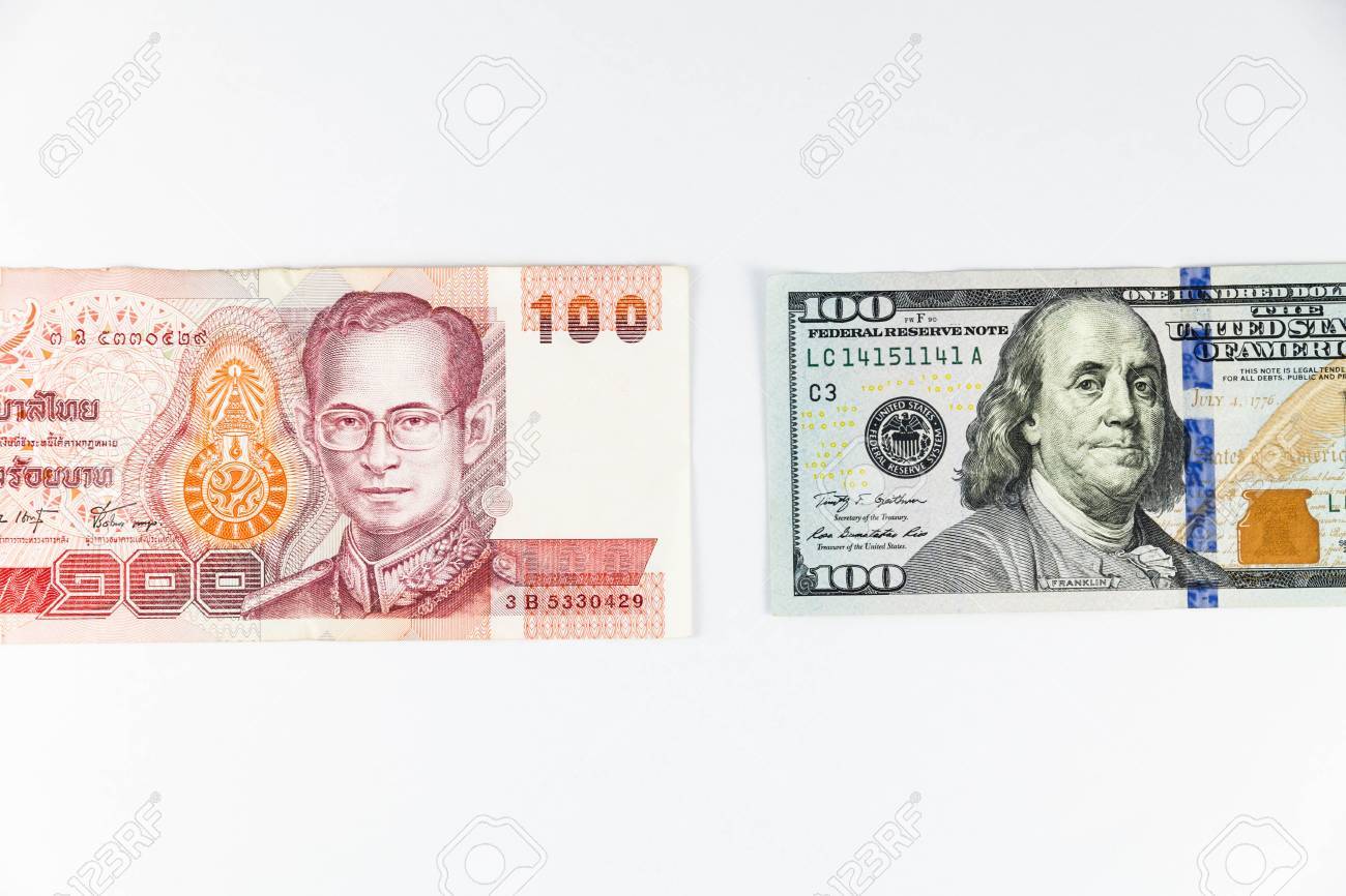 Close Up View Of US Dollar And Thai Baht Indicating Strong Currency Exchange  Rate Stock Photo, Picture and Royalty Free Image. Image 71406350.
