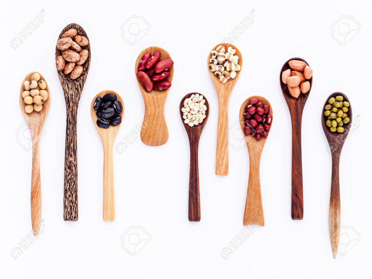 Assortment of beans and lentils in wooden spoon isolate on white background. mung bean, groundnut, soybean, red kidney bean , black bean ,red bean and brown pinto beans . - 47997428 Assortment of beans and lentils in wooden spoon isolate on white background. mung bean, groundnut, soybean, red kidney bean , black bean ,red bean and brown pinto beans . - 47997428