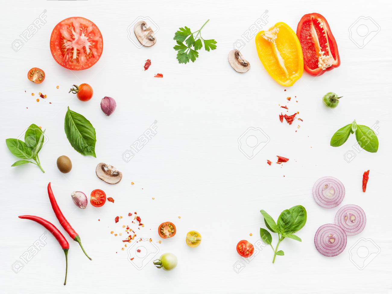 The ingredients for homemade pizza on white wooden background. - 108911799 The ingredients for homemade pizza on white wooden background. - 108911799