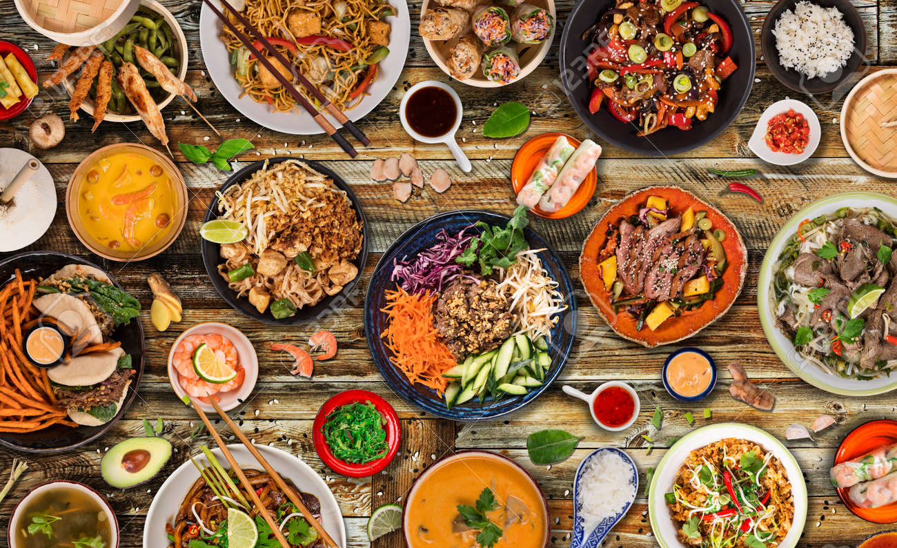 Asian food background with various ingredients on rustic wooden background , top view. - 144519148 Asian food background with various ingredients on rustic wooden background , top view. - 144519148