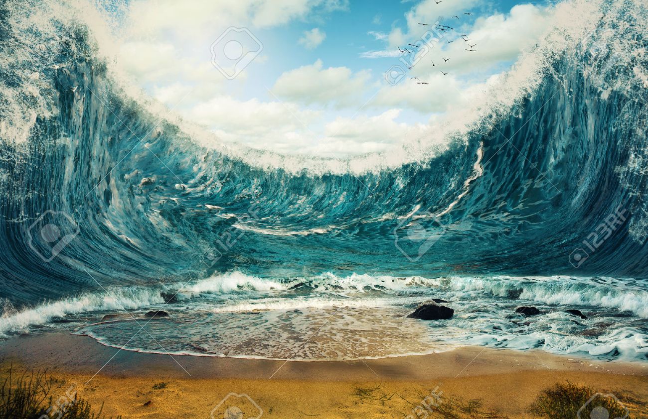 Surreal image of huge waves surrounding dry sand. - 40236603 Surreal image of huge waves surrounding dry sand. - 40236603