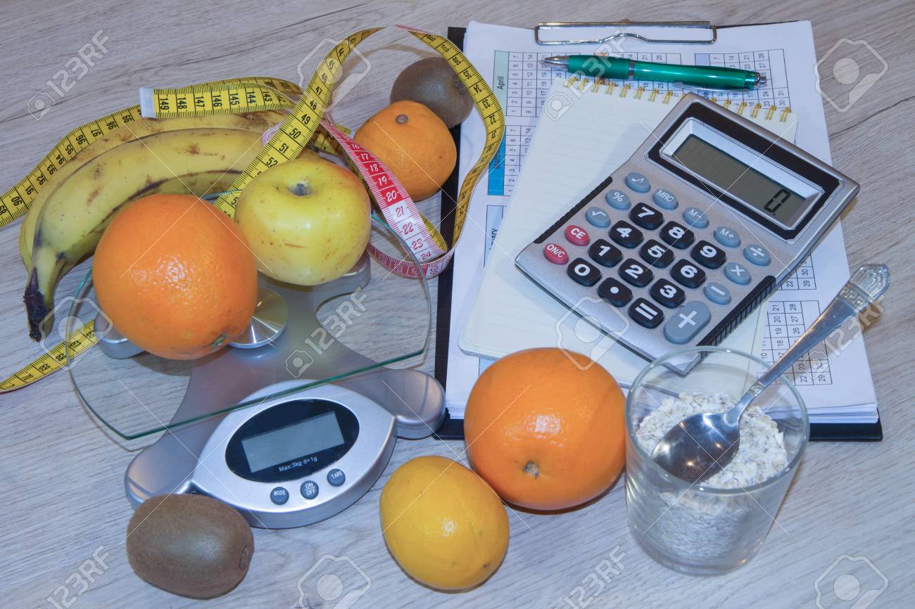 fruits and vitamins with measuring tape diet plan the concept
