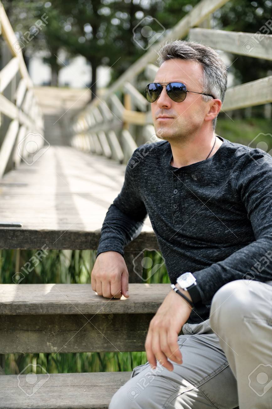Handsome Man Outdoor Male Portrait Single Beautiful Man Posing Stock Photo Picture And Royalty Free Image Image 111496354 handsome man outdoor male portrait single beautiful man posing