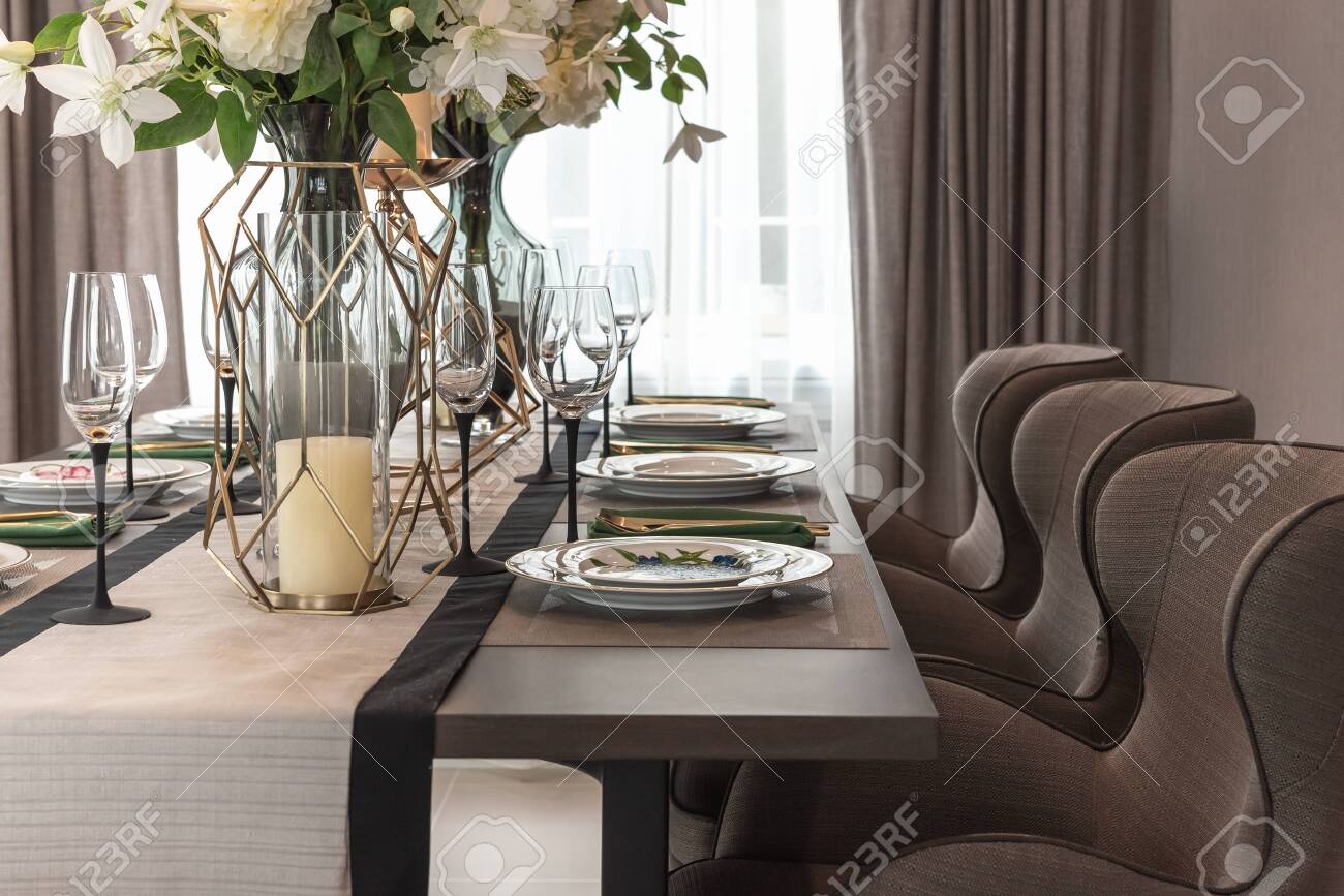 Classic Dining Room With Wooden Table And Setting For Dinner Stock Photo Picture And Royalty Free Image Image 131277699