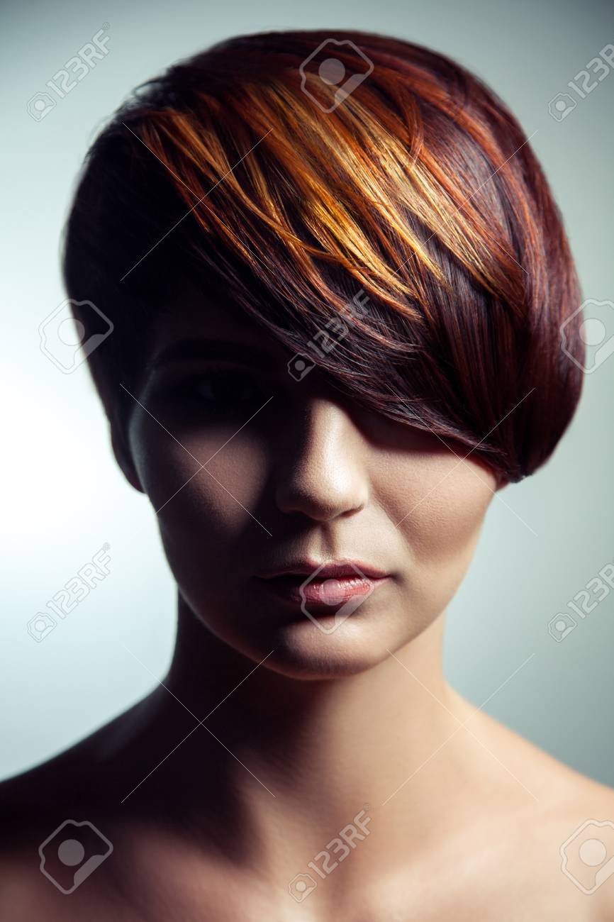 Fashion Portrait Of A Beautiful Girl With Colored Dyed Hair