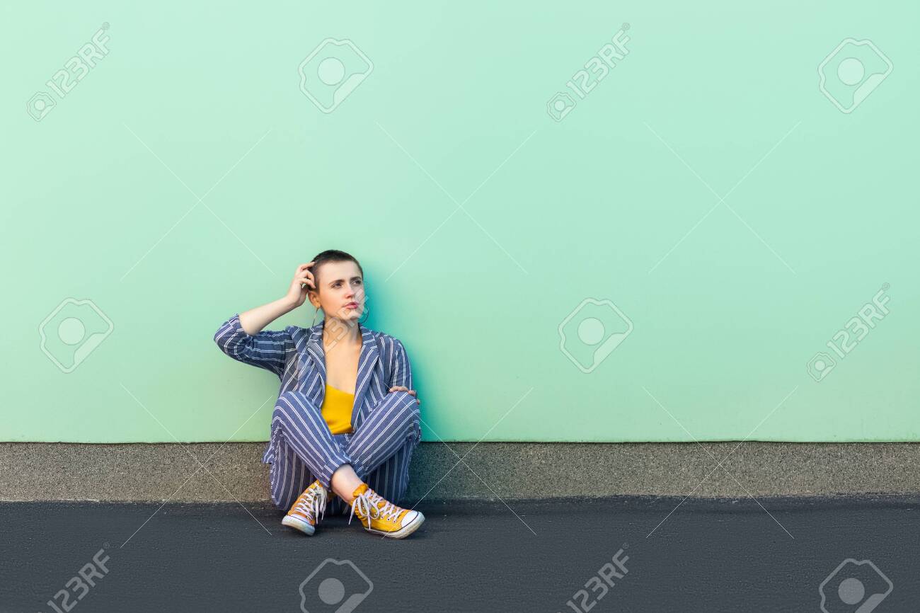 Portrait Of Confused Or Thoughtful Handsome Beautiful Short Hair
