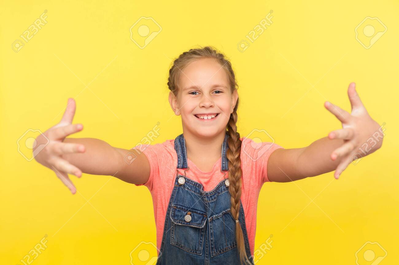 yellow baggy overalls