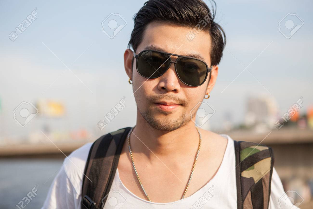 portrait close up head shot of handsome asian man - 52147593 portrait close up head shot of handsome asian man - 52147593