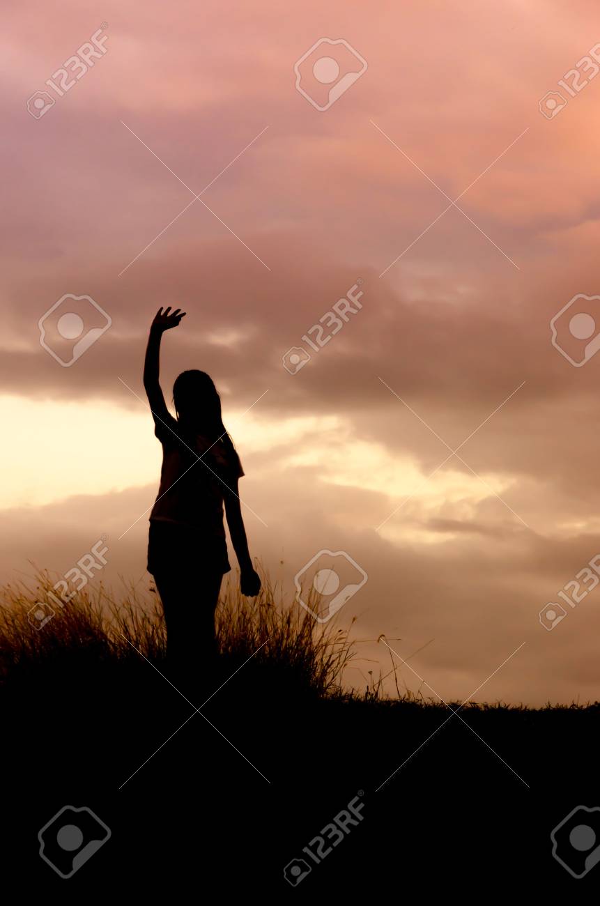 Woman Standing Alone At The Field During Beautiful Sunset Stock Photo,  Picture and Royalty Free Image. Image 45960676., image size:861x1300