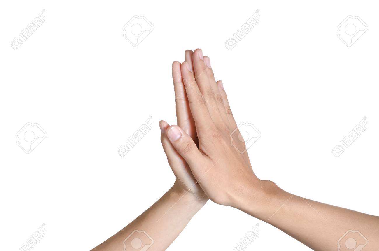two hands of asian people making hi five gesture stock photo