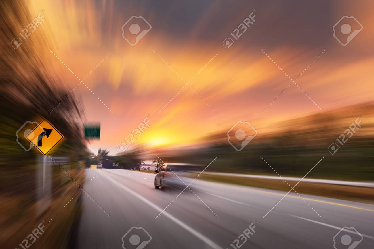 Motion Movement of Vehicle Car in Transportation Mode on Traffic Road, Motions Blur of Automotive While Speed Moving on Motorway During Sunset Scene. Transport Car Driving and Safety concept - 144470609 Motion Movement of Vehicle Car in Transportation Mode on Traffic Road, Motions Blur of Automotive While Speed Moving on Motorway During Sunset Scene. Transport Car Driving and Safety concept - 144470609