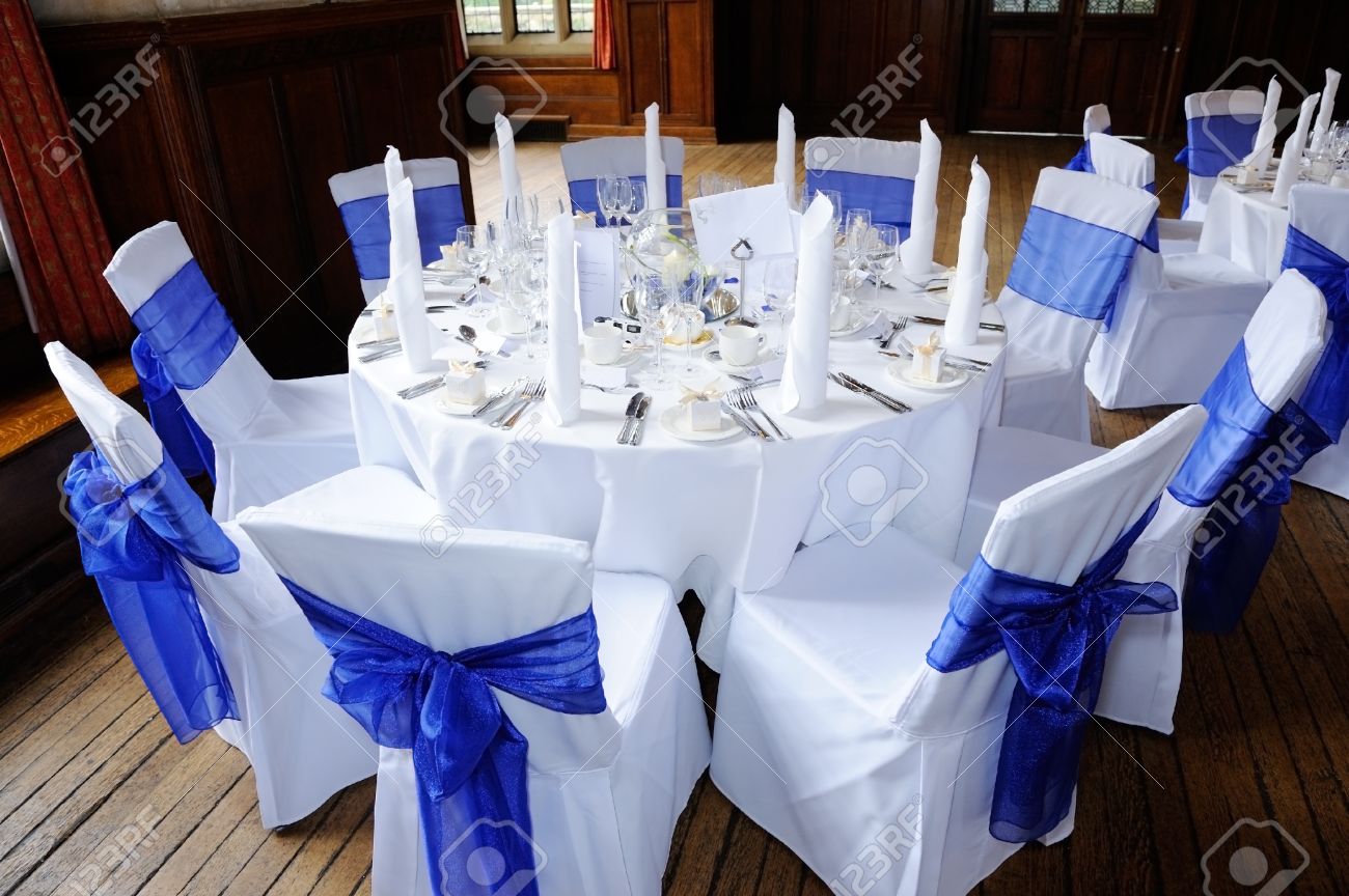 Wedding Table Wedding Tables And Chairs Decorations table and chairs decorated in blue white at wedding reception stock photo reception