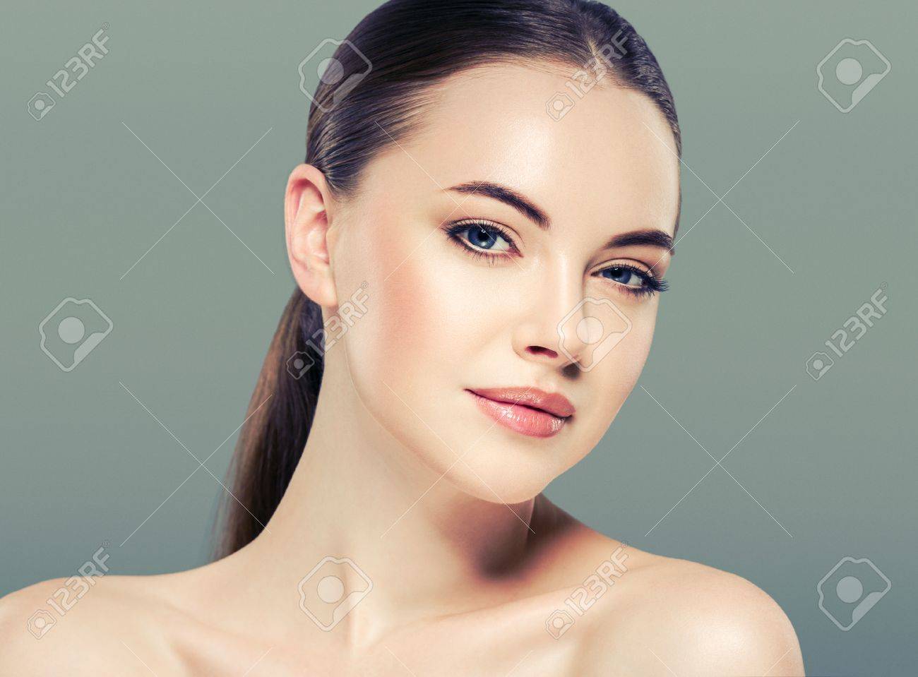 Woman beauty portrait isolated on white skin care concept on blue background - 66087859 Woman beauty portrait isolated on white skin care concept on blue background - 66087859