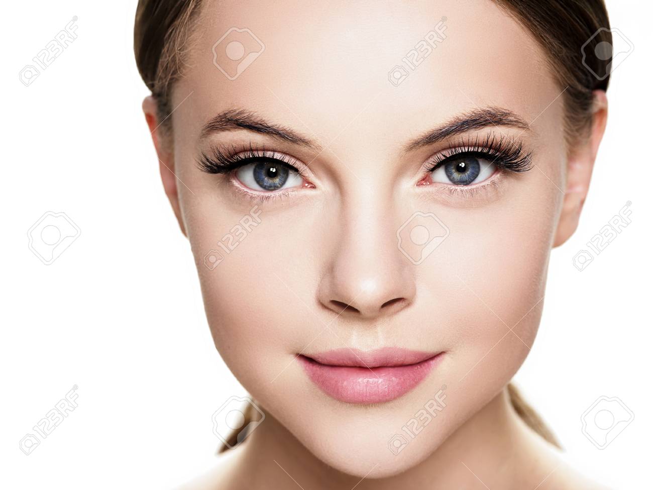 Beautiful woman face with eyelashes beauty healthy skin natural makeup. Studio shot. - 115672817 Beautiful woman face with eyelashes beauty healthy skin natural makeup. Studio shot. - 115672817