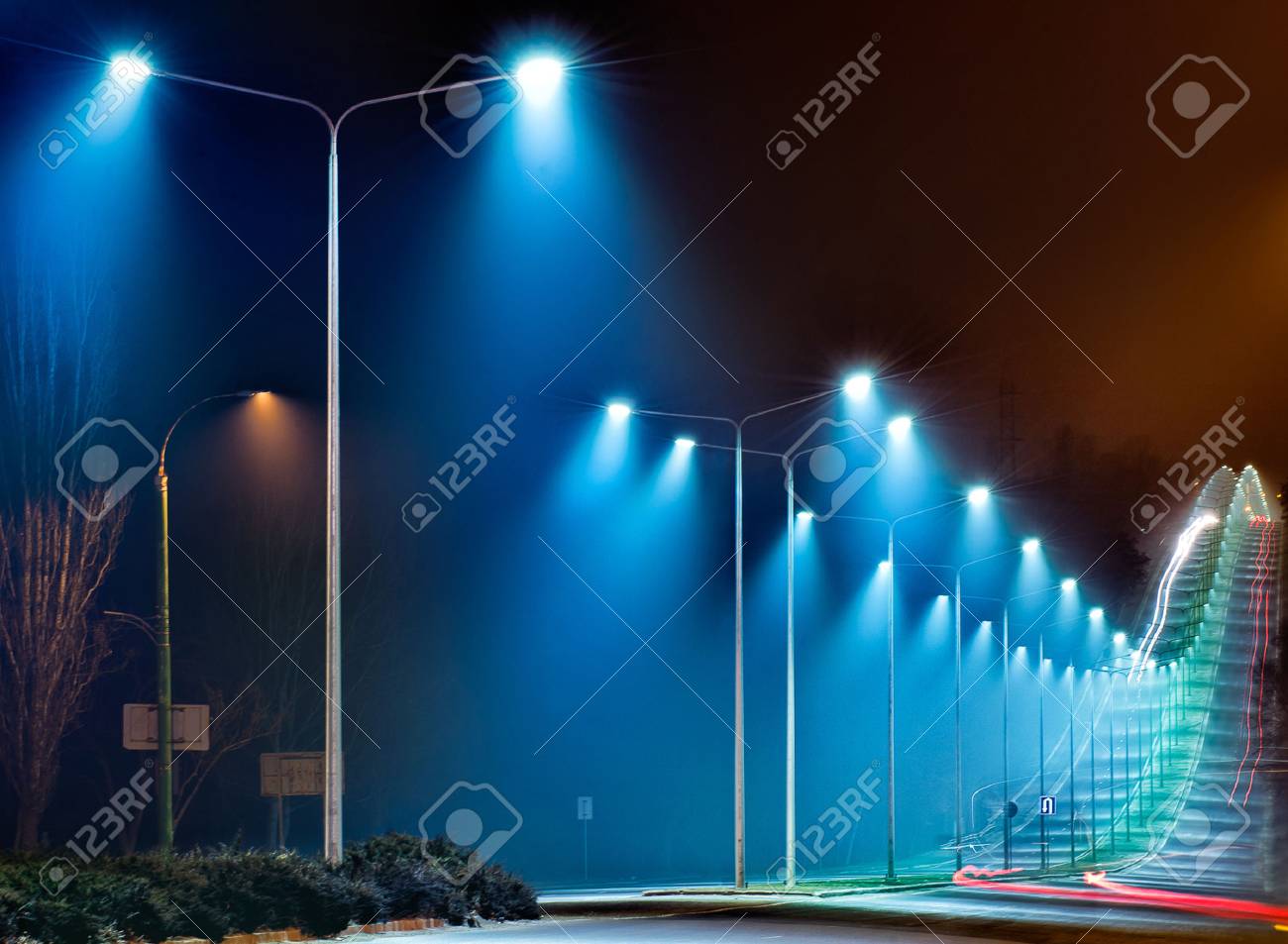 Beautiful Road With Lights At Night Stock Photo, Picture and Royalty Free  Image. Image 73832609.
