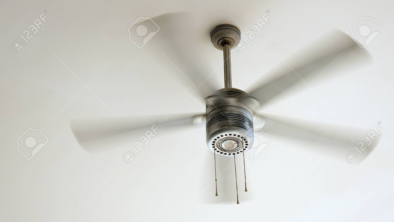 Ceiling Fan Is Rotating At The Ceiling Of The Room Electric