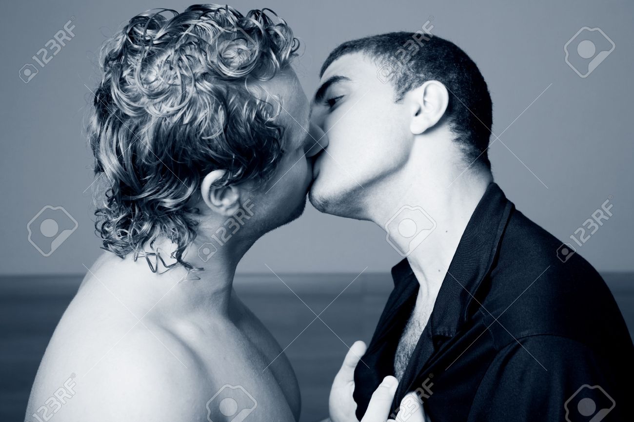 Photo of two homoual man kissing, horizontal - 3312731.
