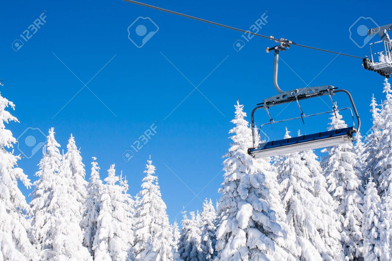 empty chair lift new ski resort image with empty chair lift blue sky and white snowy pine trees at resort image with empty chair lift blue sky and white snowy empty chair lift new ski resort image with empty chair lift blue sky and white snowy pine trees at resort image with empty chair lift blue sky and white snowy