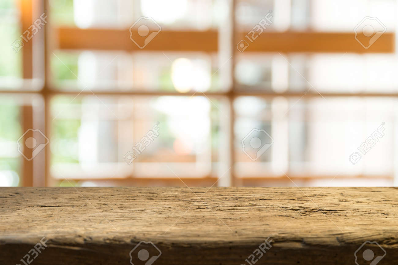 Empty of wood table top on blur of curtain with window view green from tree garden background.For montage product display or design key visual layout - 125408553 Empty of wood table top on blur of curtain with window view green from tree garden background.For montage product display or design key visual layout - 125408553