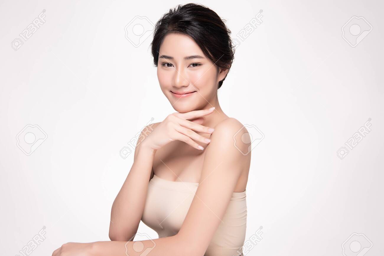 Beautiful young Asian woman touching soft cheek and smile with clean and fresh skin. Happiness and cheerful with, isolated on white background, Beauty and Cosmetics Concept, - 133957142 Beautiful young Asian woman touching soft cheek and smile with clean and fresh skin. Happiness and cheerful with, isolated on white background, Beauty and Cosmetics Concept, - 133957142