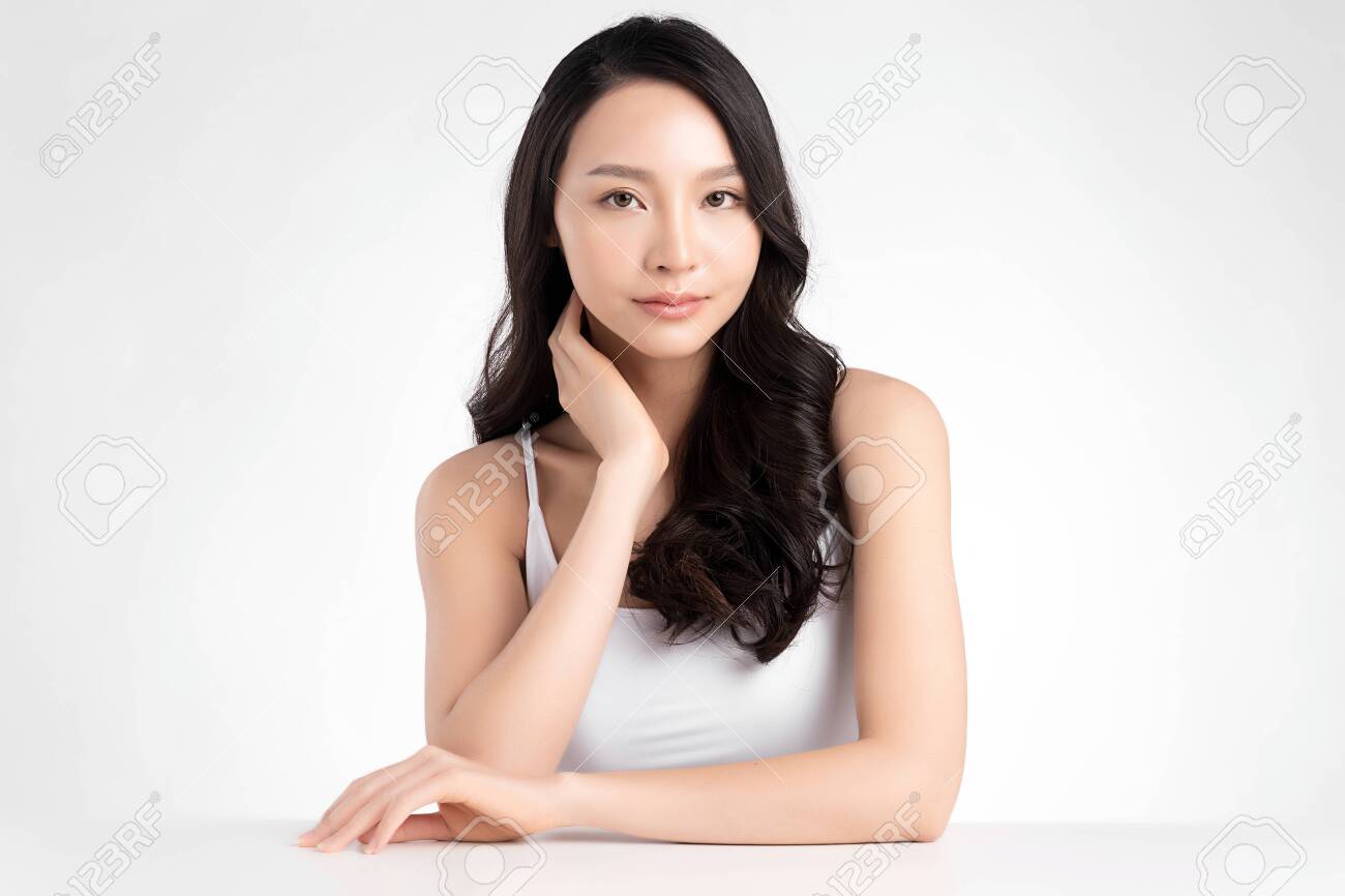 Beautiful Young asian Woman with Clean Fresh Skin, on white background, Face care, Facial treatment. Cosmetology, beauty and spa. Asian women portrait - 153254970 Beautiful Young asian Woman with Clean Fresh Skin, on white background, Face care, Facial treatment. Cosmetology, beauty and spa. Asian women portrait - 153254970