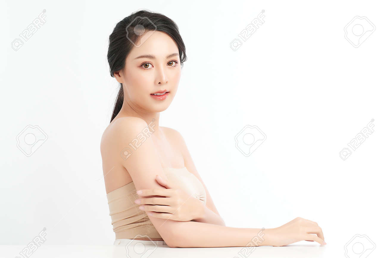 Beautiful young asian woman with clean fresh skin on white background, Face care, Facial treatment, Cosmetology, beauty and spa, Asian women portrait. - 168228142 Beautiful young asian woman with clean fresh skin on white background, Face care, Facial treatment, Cosmetology, beauty and spa, Asian women portrait. - 168228142