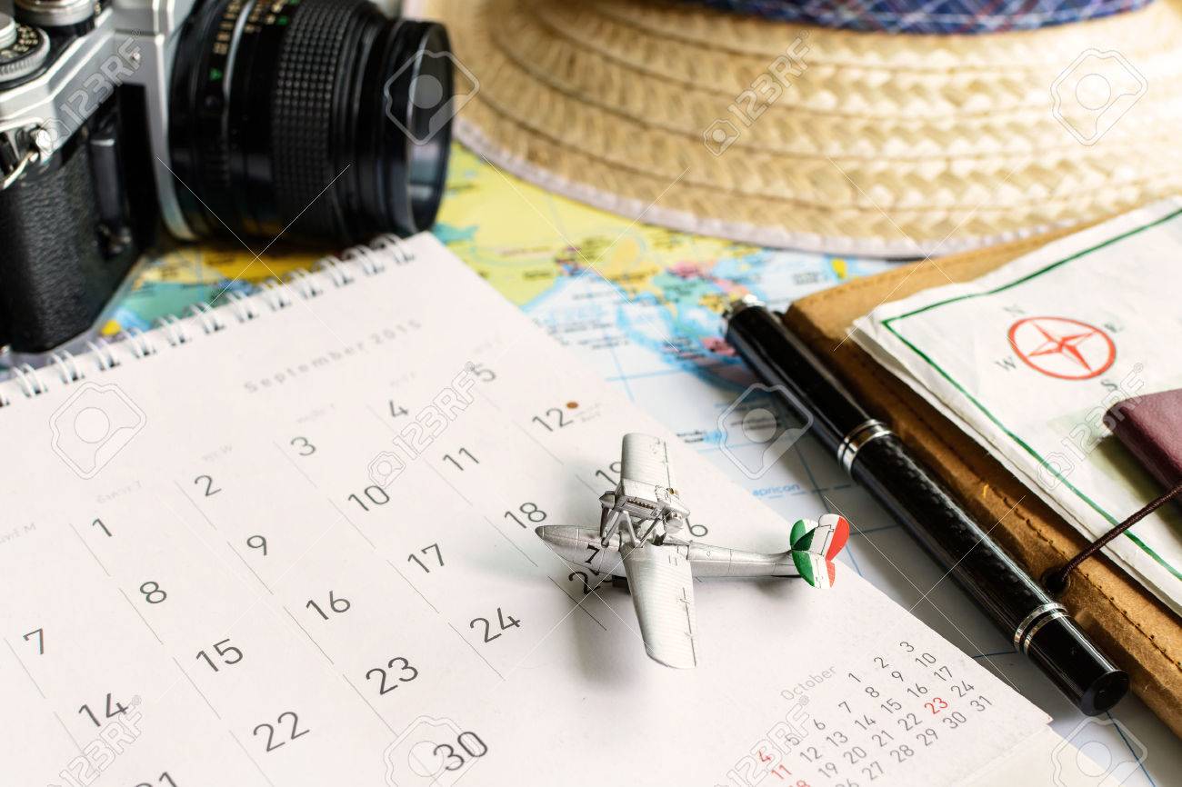 diary and calendar with passport travel planning stock photo travel calendar
