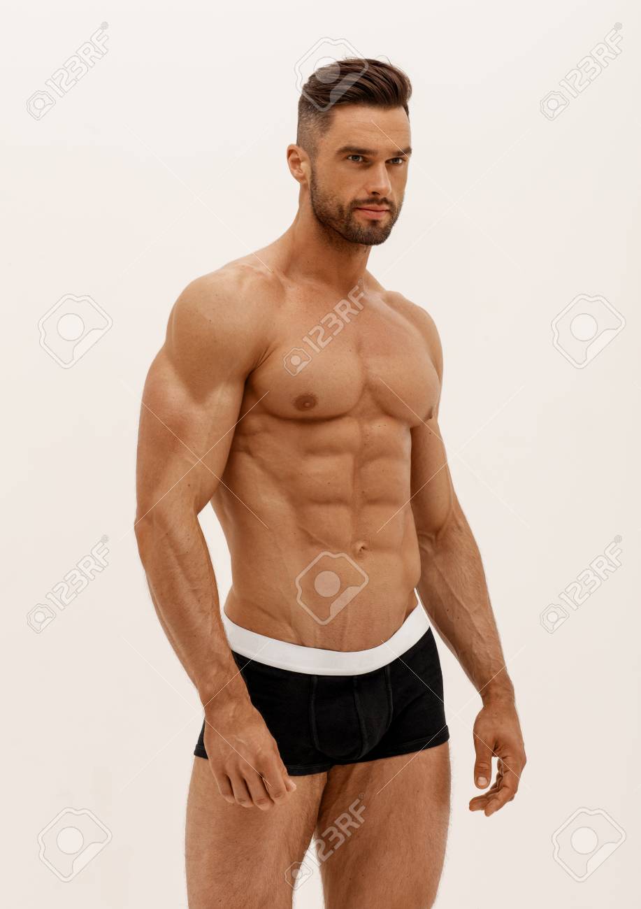 112441407-sexy-man-in-underwear-isolated-on-white-background.jpg
