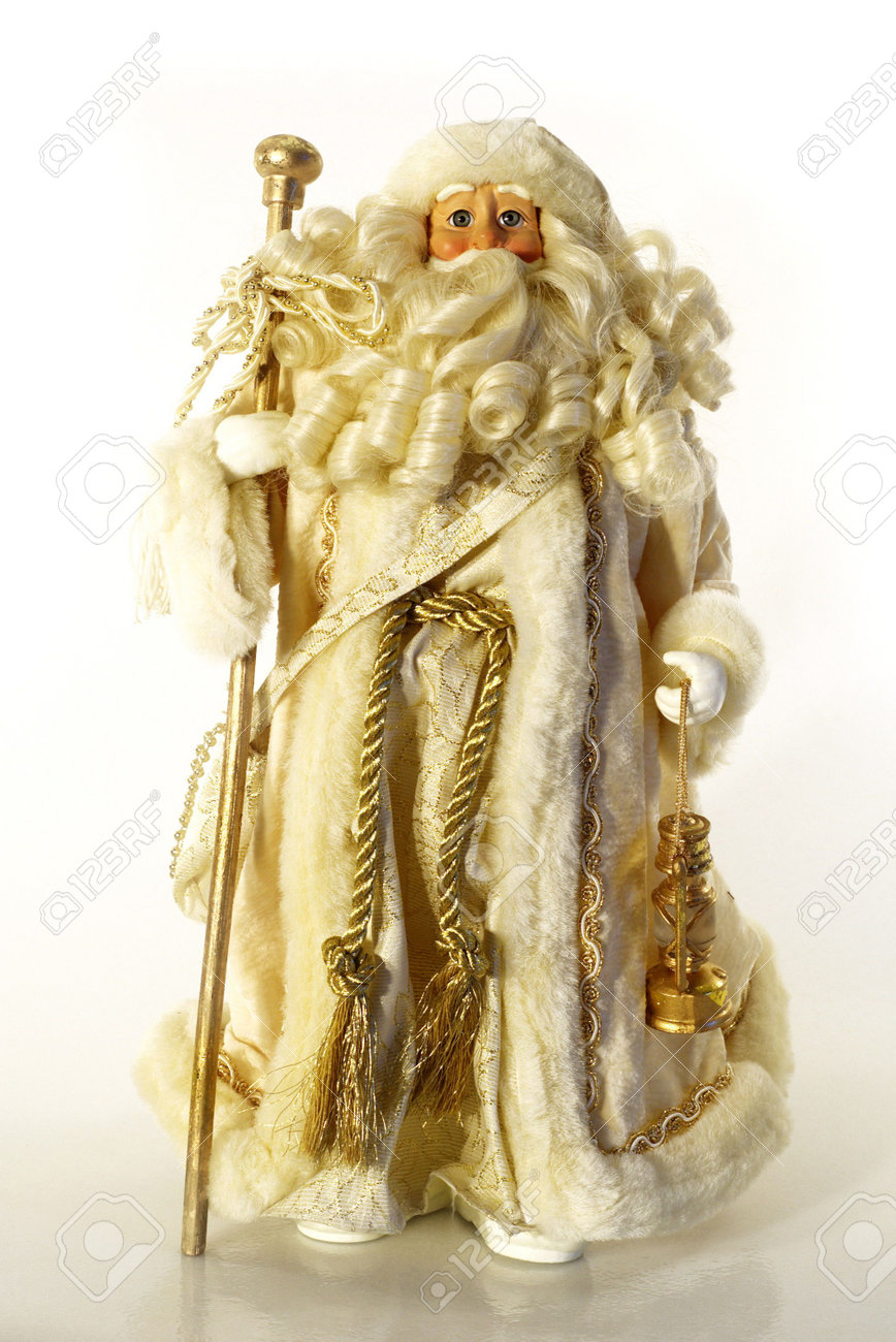 a figurine of and old time santa claus in white and gold robe holding lantern and - White Santa Claus a figurine of and old time santa claus in white and gold robe holding lantern and - White Santa Claus