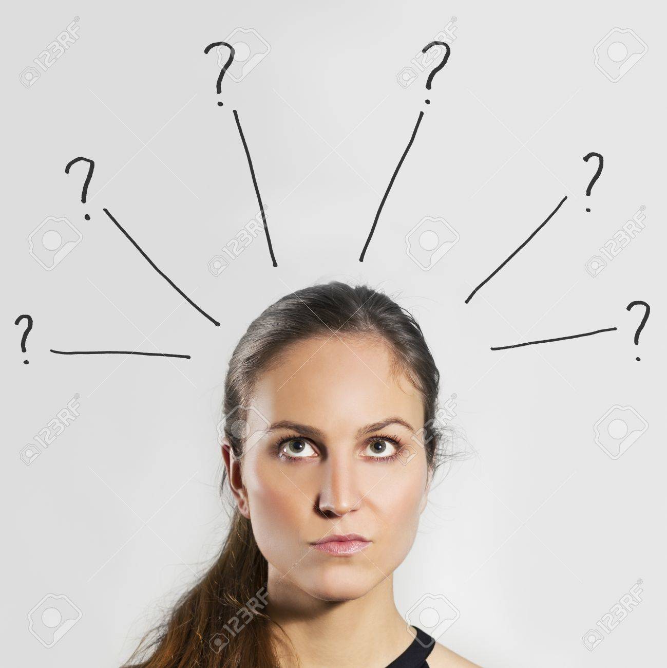 young woman girl thinking wondering with gray background stock