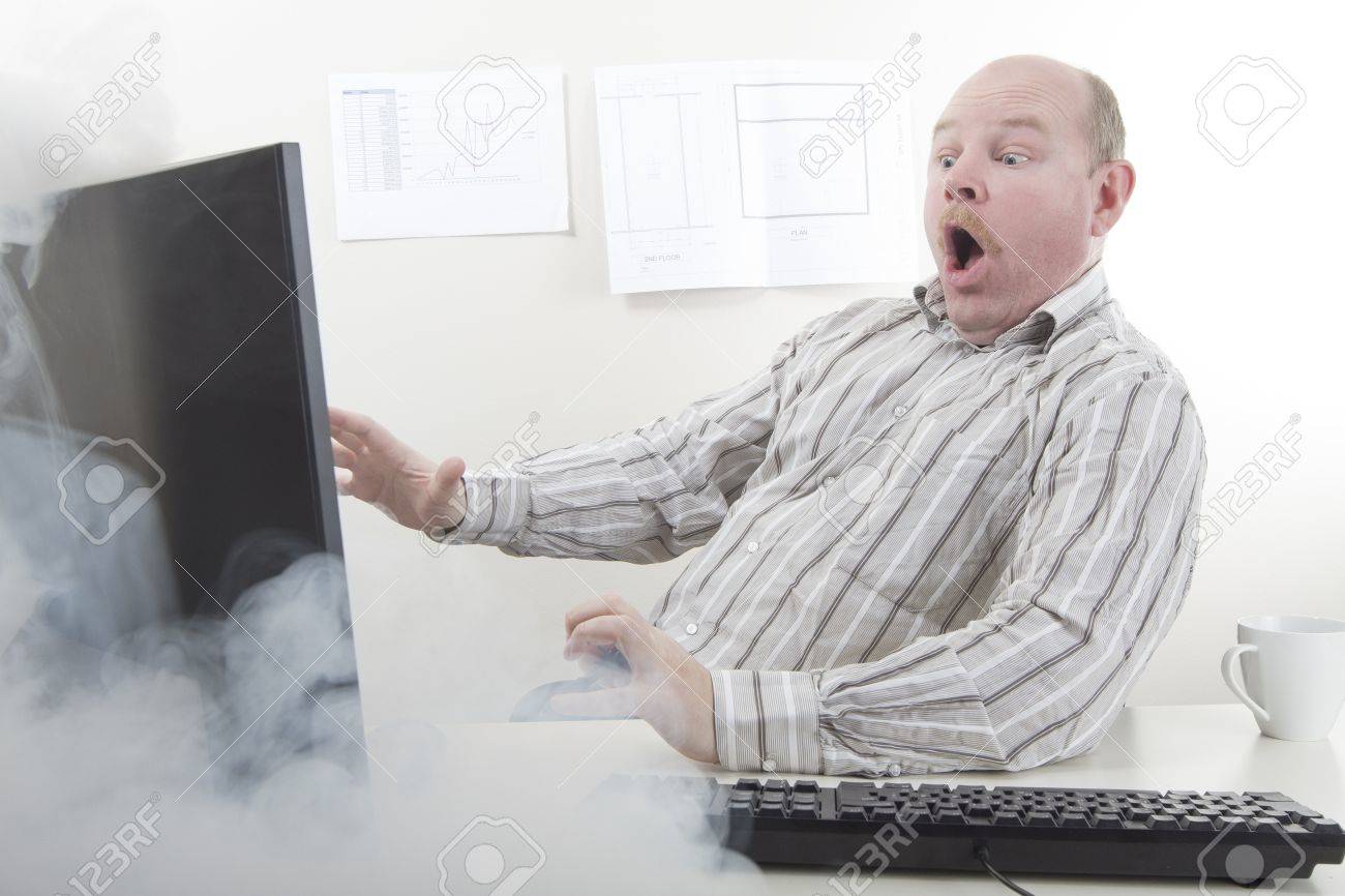 19200413-office-worker-businessman-with-computer-problems-or-very-fast-internet-computer-smoke-coming-from-th.jpg