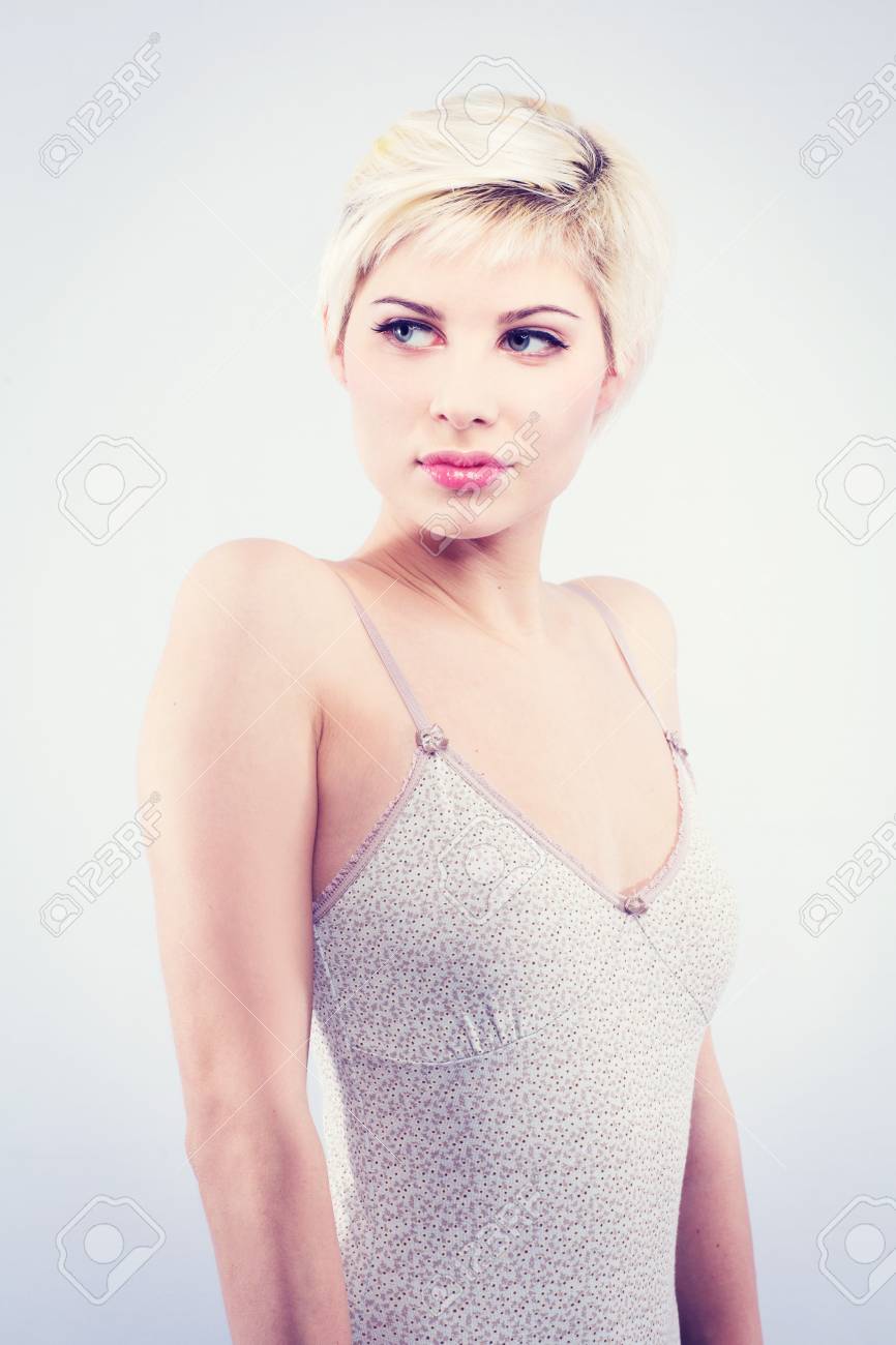 Smiling Vintage Looking Girl With Creative Undercut Haircut