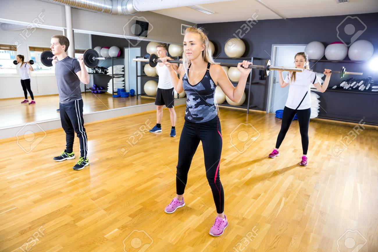 focused workout group doing