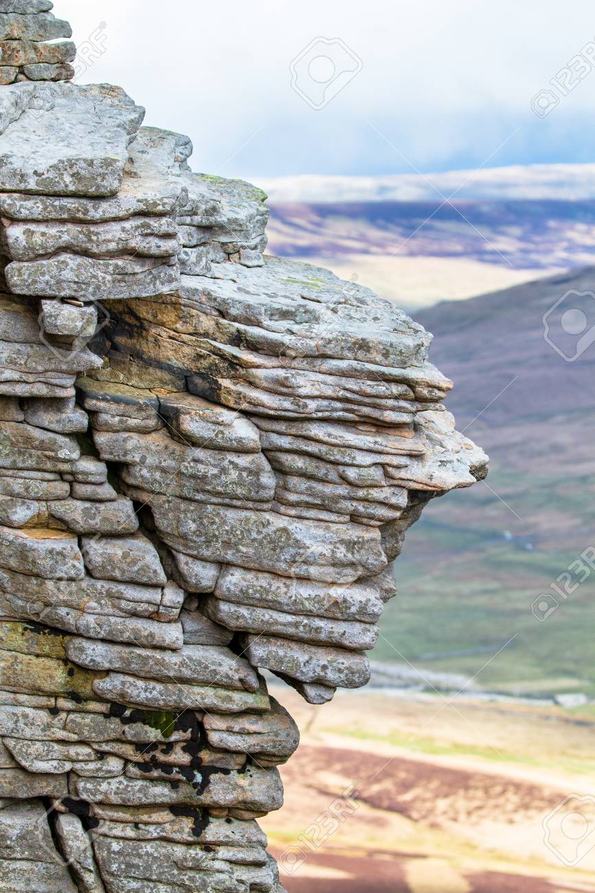 Rock layers smoothed by years of weathering are seen near the summit of Pen-y-Ghent in the Peak District, England. - 120581707 Rock layers smoothed by years of weathering are seen near the summit of Pen-y-Ghent in the Peak District, England. - 120581707