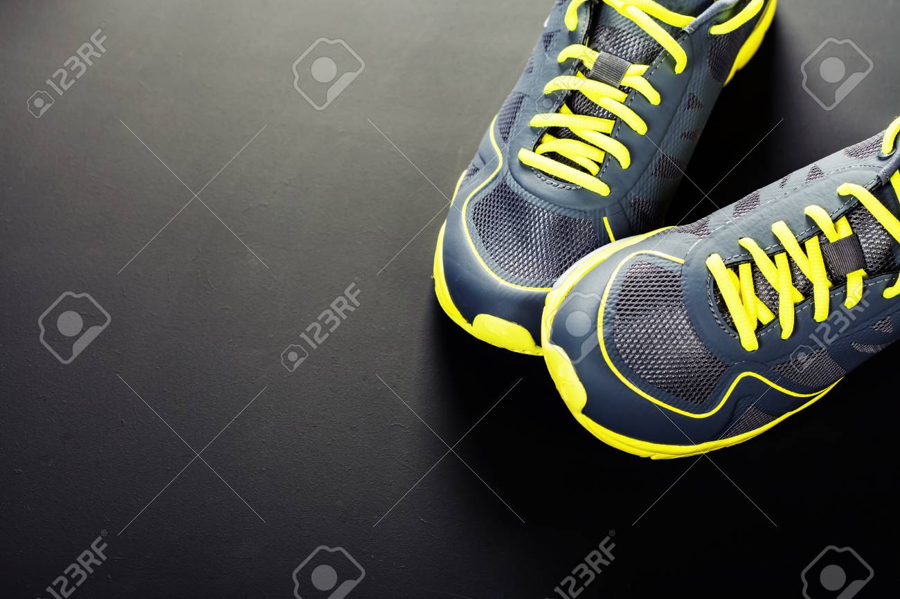 Sport Shoes On Grey Background Stock Photo Picture And Royalty