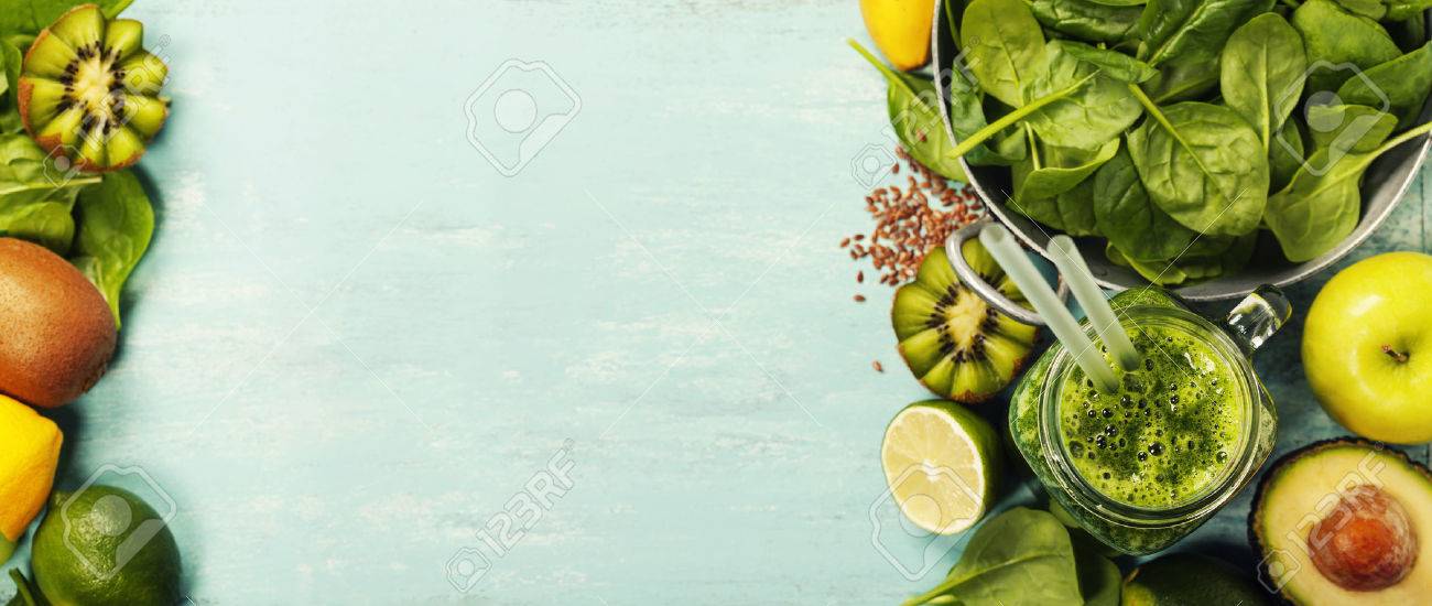 Healthy green smoothie and ingredients on blue background - superfoods, detox, diet, health, vegetarian food concept - 59803395 Healthy green smoothie and ingredients on blue background - superfoods, detox, diet, health, vegetarian food concept - 59803395