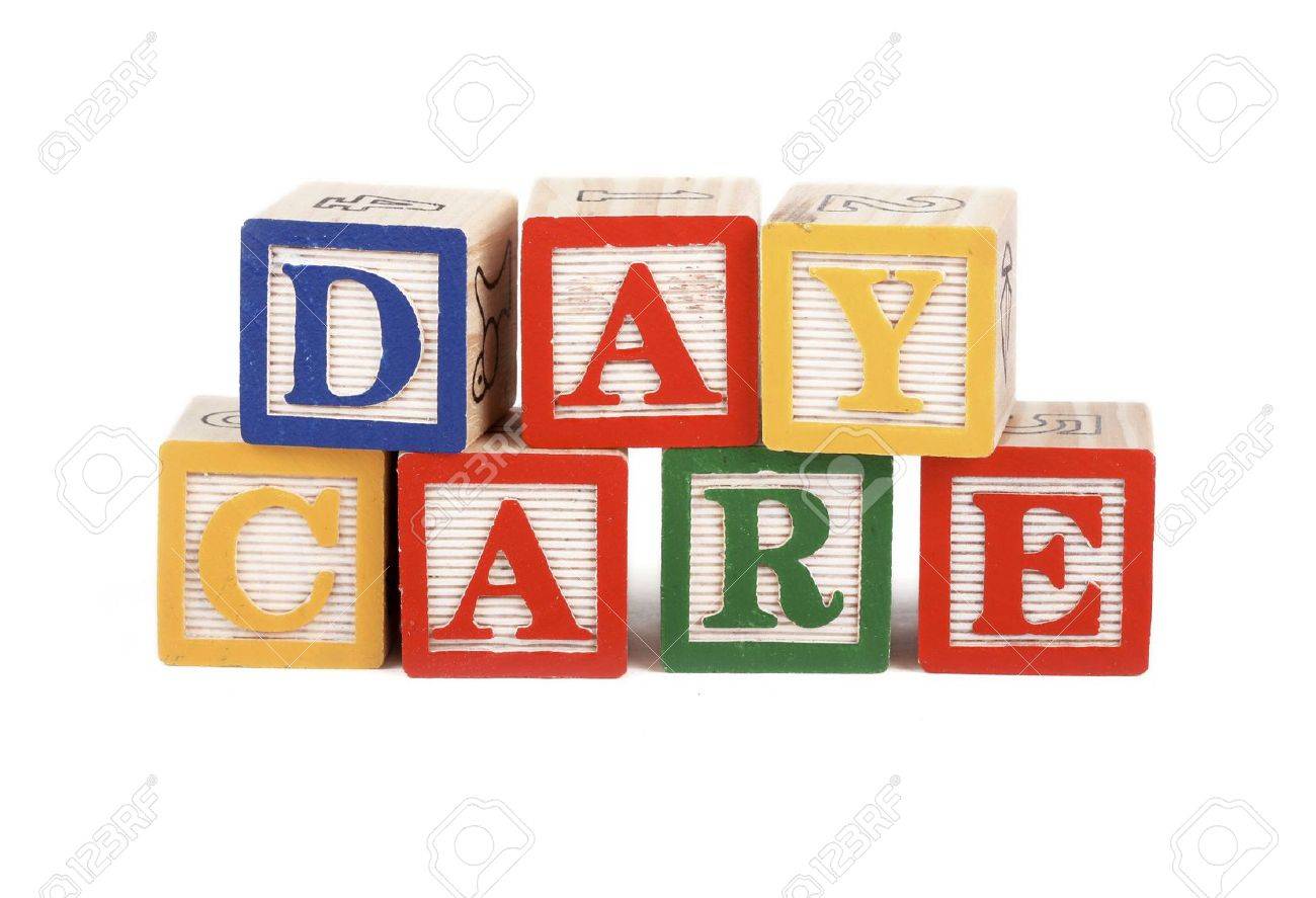 alphabet blocks lined up to spell the word daycare isolated on white stock photo 2515146