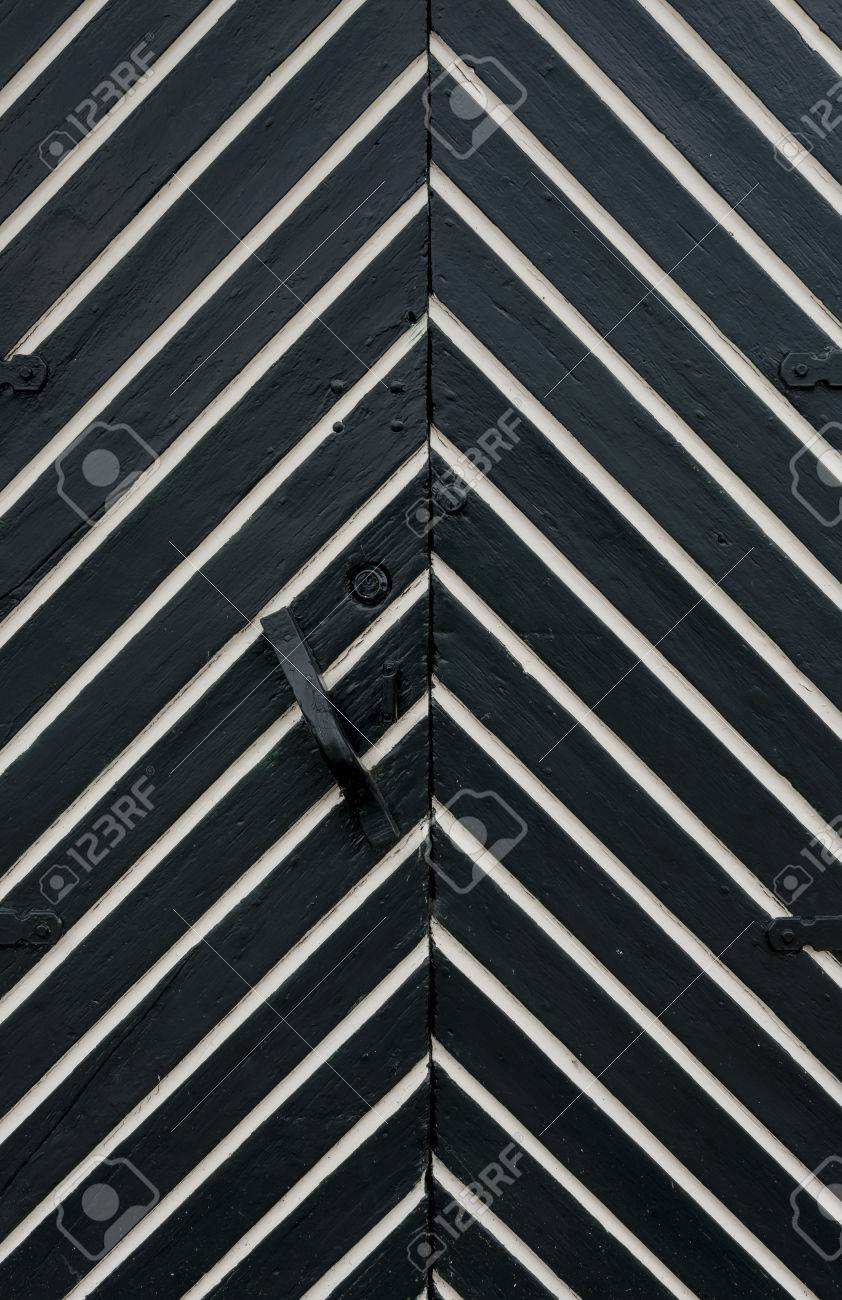 white and black door with fish bone pattern stock photo picture