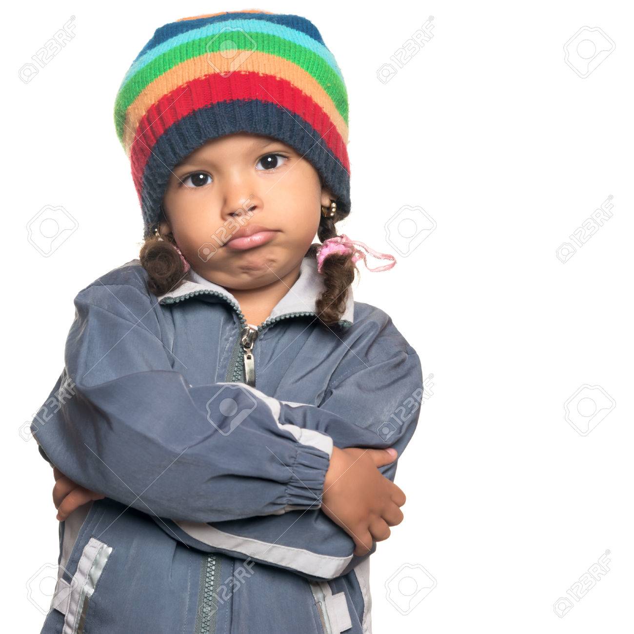Funny Mixed Race Little Girl Wearing A Colorful Beanie Hat And A Jacket With A Rapper Funny Mixed Race Little Girl Wearing A Colorful Beanie Hat And A Jacket With A Rapper