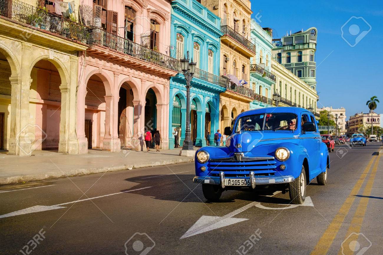 Street scene with old car and colorful buildings in Old Havana - 59196826 Street scene with old car and colorful buildings in Old Havana - 59196826