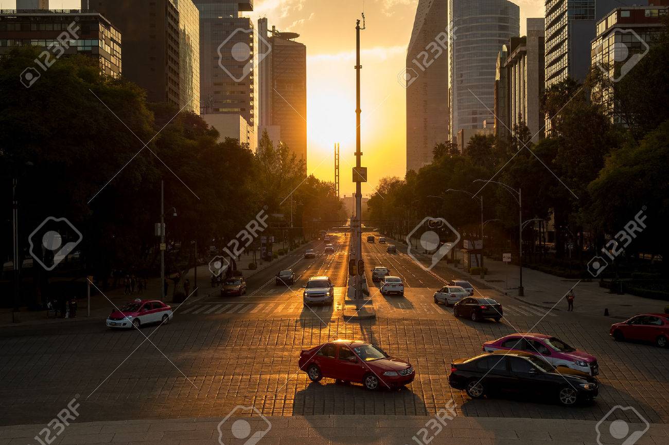 Sunset in Mexico City with a view of traffic and buildings at Paseo de la Reforma - 69331898 Sunset in Mexico City with a view of traffic and buildings at Paseo de la Reforma - 69331898