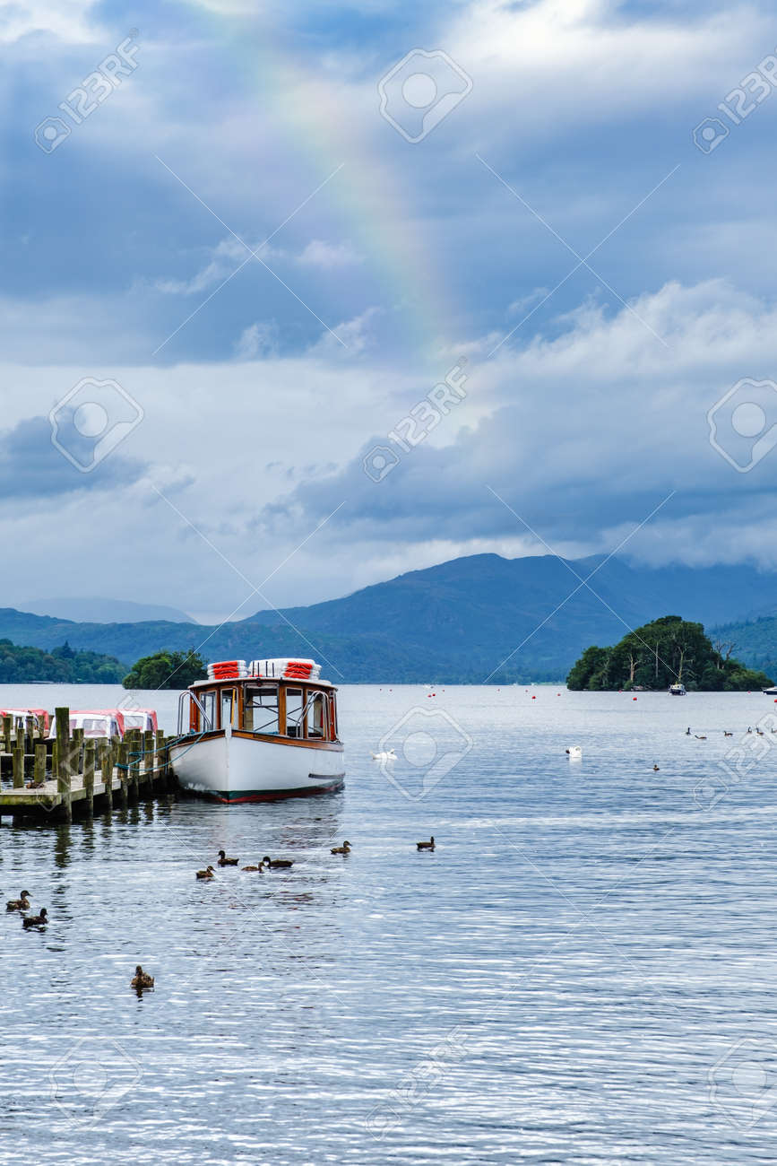 Rainbow over Lake Windermere on the beautiful Lake District in England - 158974043 Rainbow over Lake Windermere on the beautiful Lake District in England - 158974043