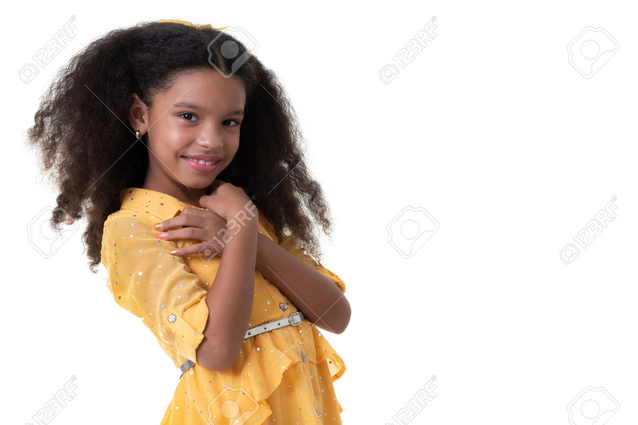 Portrait of a cute multiracial small girl with beautiful curly hair - Isolated on white - 159904535 Portrait of a cute multiracial small girl with beautiful curly hair - Isolated on white - 159904535