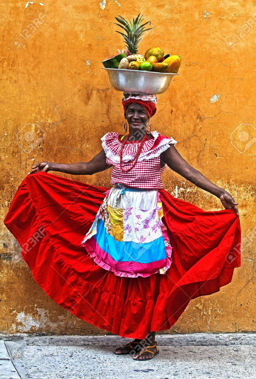 CARTAGENA DE INDIAS , COLOMBIA - DEC 21:Unidentified Palenquera woman sell fruts in Cartagena de Indias on December 21 2010,Palenqueras are a unique African descendat ethnic group found in the north region of South America - 10986561 CARTAGENA DE INDIAS , COLOMBIA - DEC 21:Unidentified Palenquera woman sell fruts in Cartagena de Indias on December 21 2010,Palenqueras are a unique African descendat ethnic group found in the north region of South America - 10986561