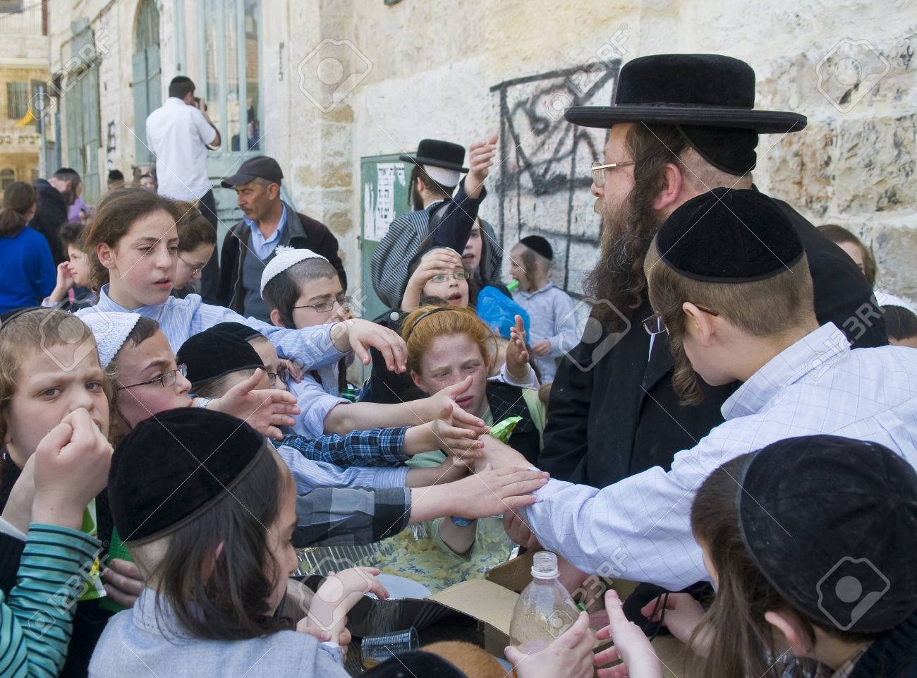 jerusalem april 05 an ultra orthodox jew man handing out stock