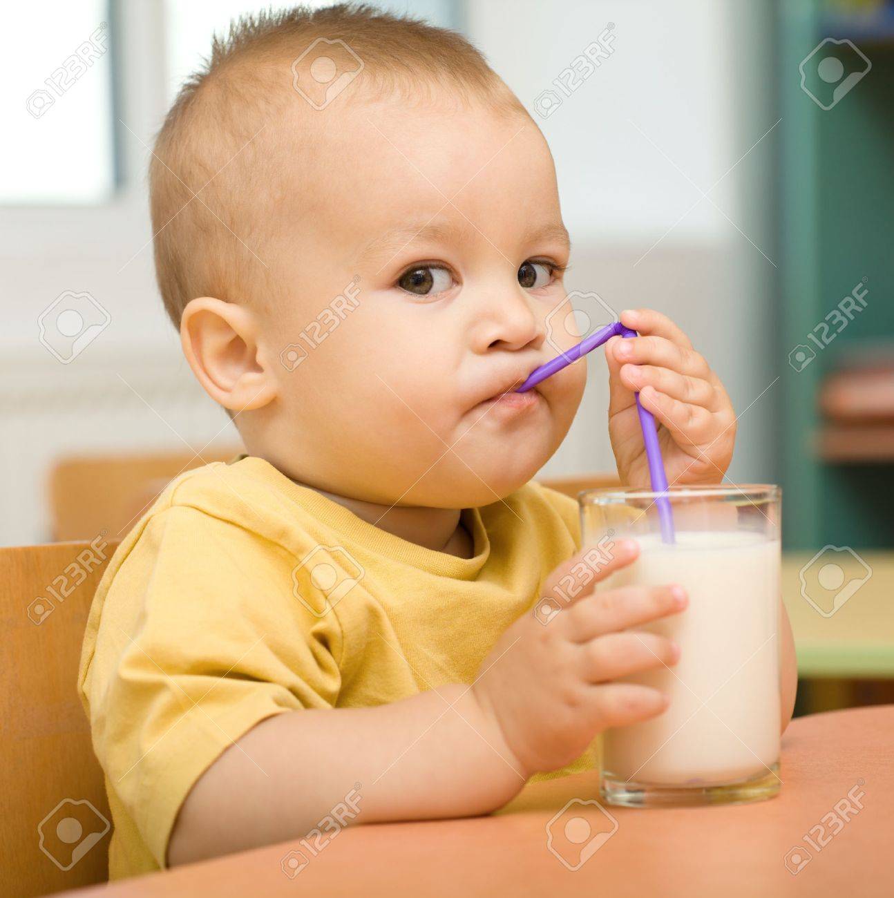 child drinking milk