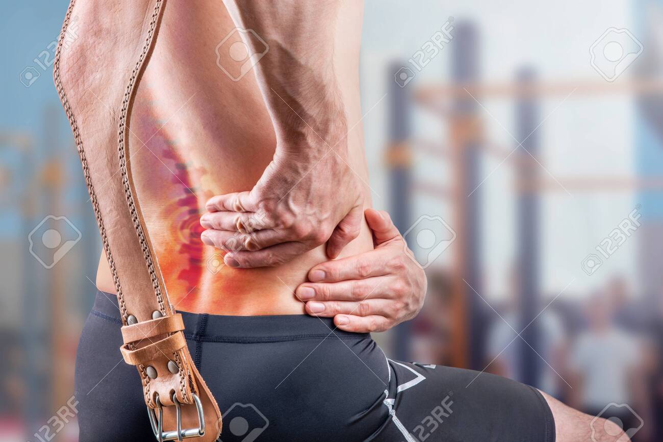 Sports Injuries In The Dorsal Spine Concept Of Lower Back Pain In A Person In The Gym After Doing Heavy Exercises Stock Photo Picture And Royalty Free Image Image 139333193