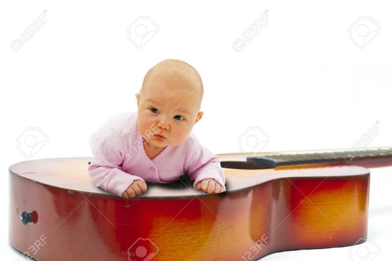 Little Baby Lying On Guitar Stock Photo Picture And Royalty Free Image Image